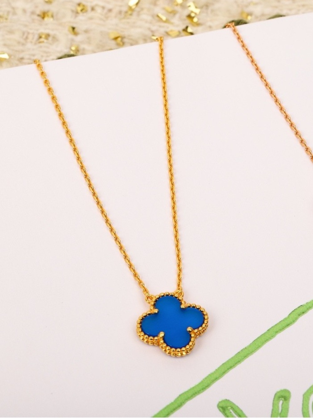 Van Cleef & Arpels Gold Necklace with Blue Alhambra Pendant